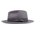 Grey Montique fedora hat side view with wide brim, matching ribbon band, bow detail, and gold Montique pin