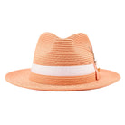 Montique peach straw fedora hat front view with white ribbon band and woven wide brim