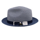Navy Montique fedora hat side view with navy ribbon band, white bow accent, woven crown, and Montique logo pin