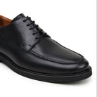 Angled view of black Italian suede Derby shoe