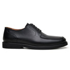 Side profile of black suede lace-up dress shoe