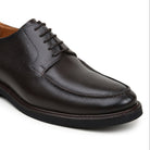 Angled view of black Italian suede Derby shoe