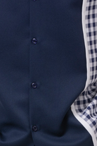close up of navy checker plaid color block walking suit shirt