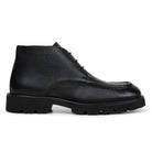 Side view of black hornback leather chukka boot