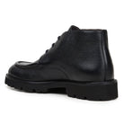 Angled view of black Belvedere calfskin chukka boot