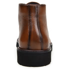 Antique tan view of black Italian calfskin chukka boot