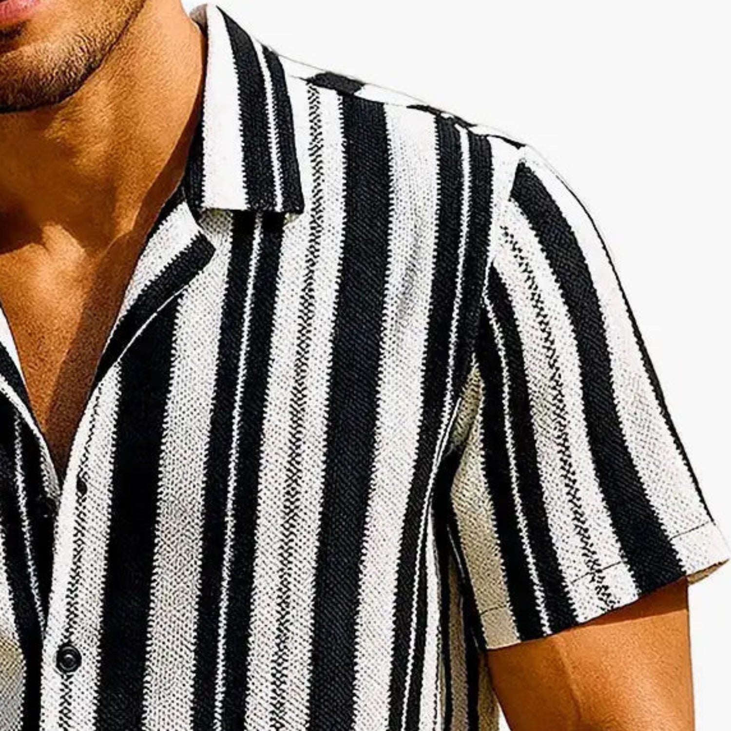 Close-up of black and white vertical stripe fabric on Stacy Adams short sleeve shirt