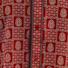 Close-up of navy geometric tile and medallion shirt print
