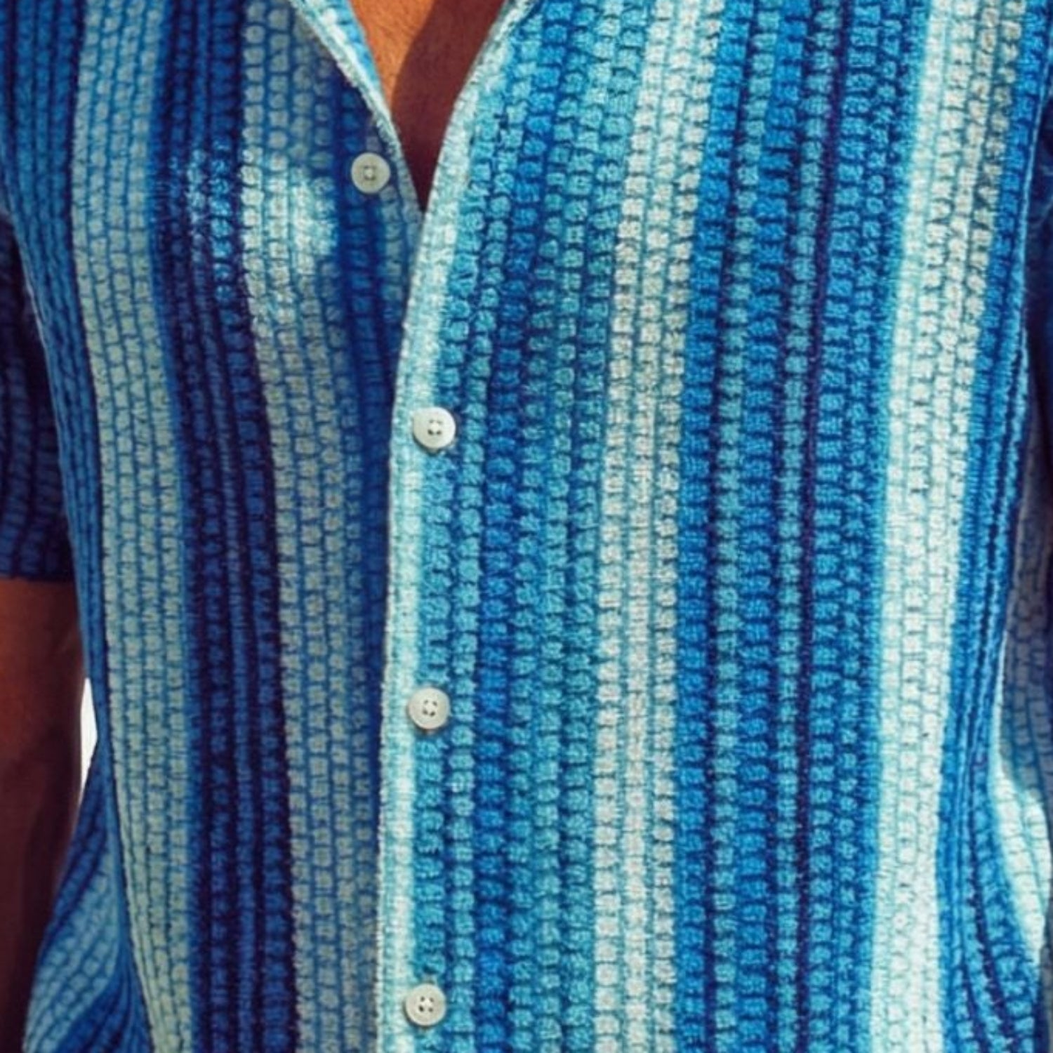 Close-up of blue multi-tone vertical stripe fabric on Stacy Adams short sleeve shirt