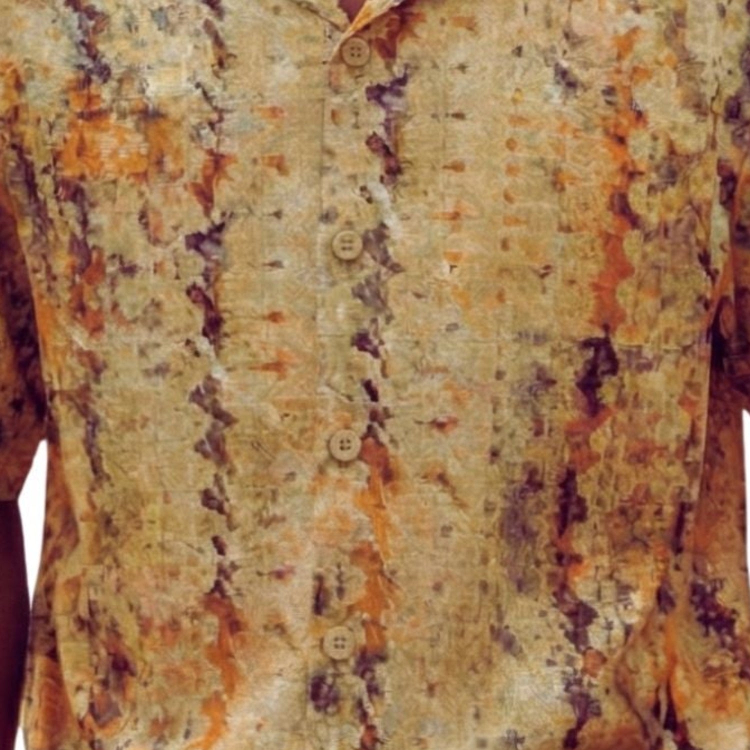 Close-up of the khaki shirt showing the abstract print and textured linen blend fabric.