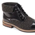 Close-up of the quilted collar and textured tweed panels on the Stuart black lace boot