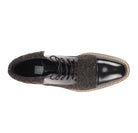 Top view of the Stuart black lace-up boot showing the cap toe, laces, and quilted collar