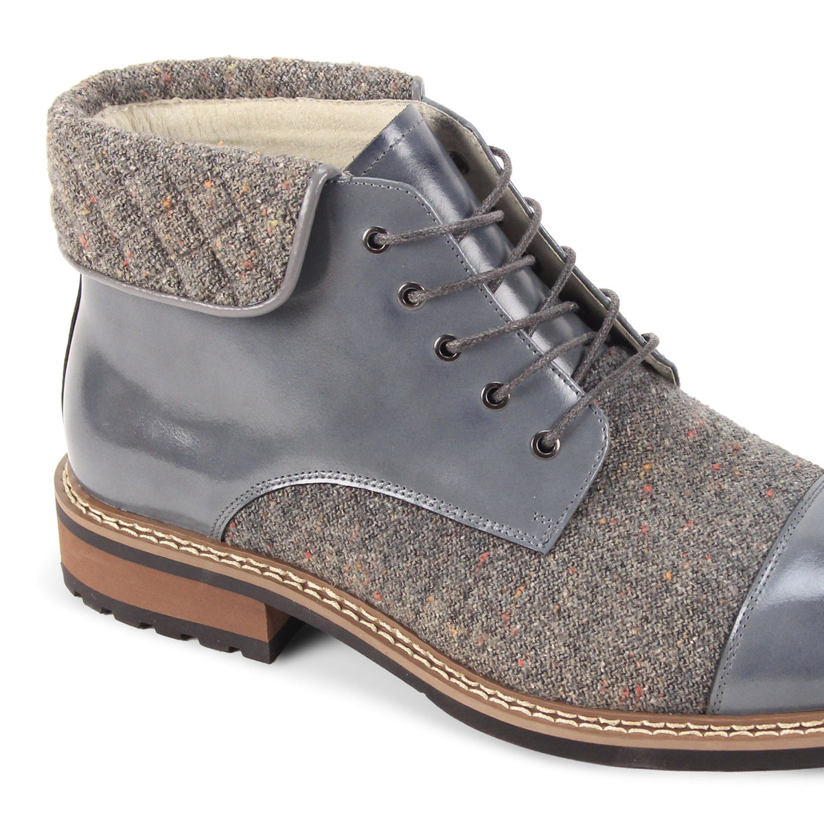 Close-up of the quilted collar and textured tweed panels on the Stuart grey lace boot
