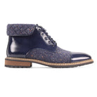 Side view of the Stuart men's navy leather and tweed cap-toe lace boot