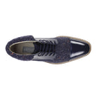 Top view of the Stuart navy lace-up boot showing the cap toe, laces, and quilted collar