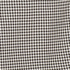 Close-up detail of black houndstooth suit jacket fabric pattern