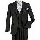 Three-quarter view of men’s black three-piece suit showing the two-button jacket and matching vest