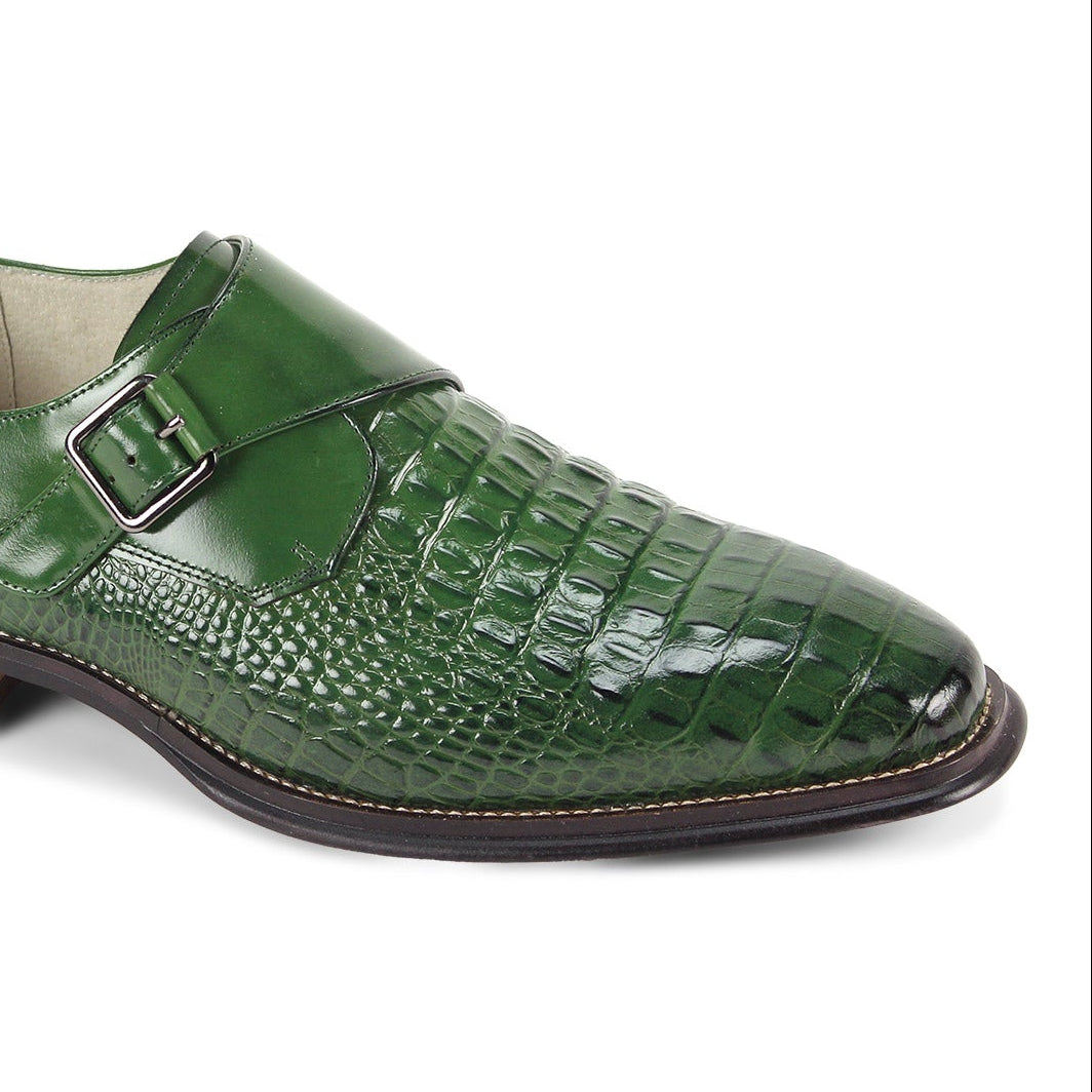 close-up angle of the men's green croco-print monk strap dress shoe