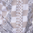 Close up of the khaki walking suit with paisley and checker pattern shirt and solid pants