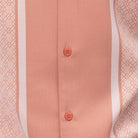 Close up of the Peach walking suit set with vertical stripe panels and matching solid pants
