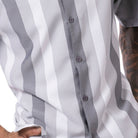 close up of the Grey vertical stripe short sleeve walking suit set with coordinated shorts