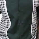 Close up of the emerald green checker plaid color block short sleeve walking suit set with matching shorts