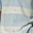 Close up of the Light blue horizontal stripe short sleeve walking suit set with matching shorts