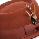 cognac pork pie wool felt hat with feather accent by montique