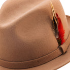 tan fedora hat with feather accent