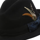 side view black fedora blue band feather