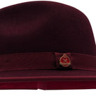 side view burgundy felt hat with red underside