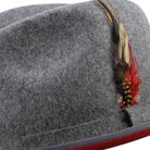 side view grey hat with red underside and feather