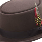 side angle brown pork pie hat with feather