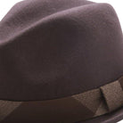 side view of brown felt fedora with contrast band