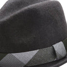 side view of hunter felt fedora with contrast band