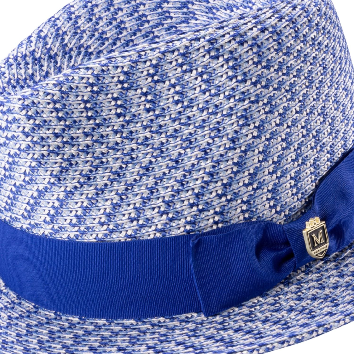 Side view woven fedora hat with royal blue ribbon and pin