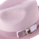 Side view of mauve braided fedora with ribbon band and pinch crown