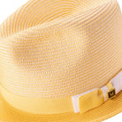 Side view of canary two tone stingy brim fedora hat with ribbon band