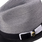 Side view of black two tone stingy brim fedora hat with ribbon band