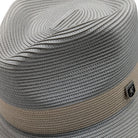 Side view of tan fedora hat with contrast band