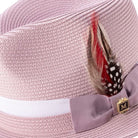 Side view mauve fedora hat with feather accent and ribbon band
