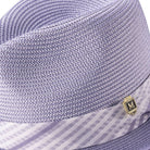 Side view of gunmetal fedora hat with striped ribbon band and pin
