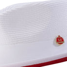 Men’s white pinch crown fedora hat with red underside brim and Montique pin