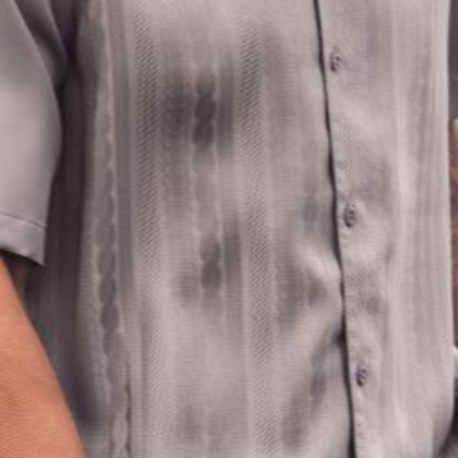 Grey tone-on-tone cable knit men's walking suit shirt close-up showing textured pattern