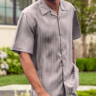 Grey cable knit men's walking suit 2-piece set side view on model