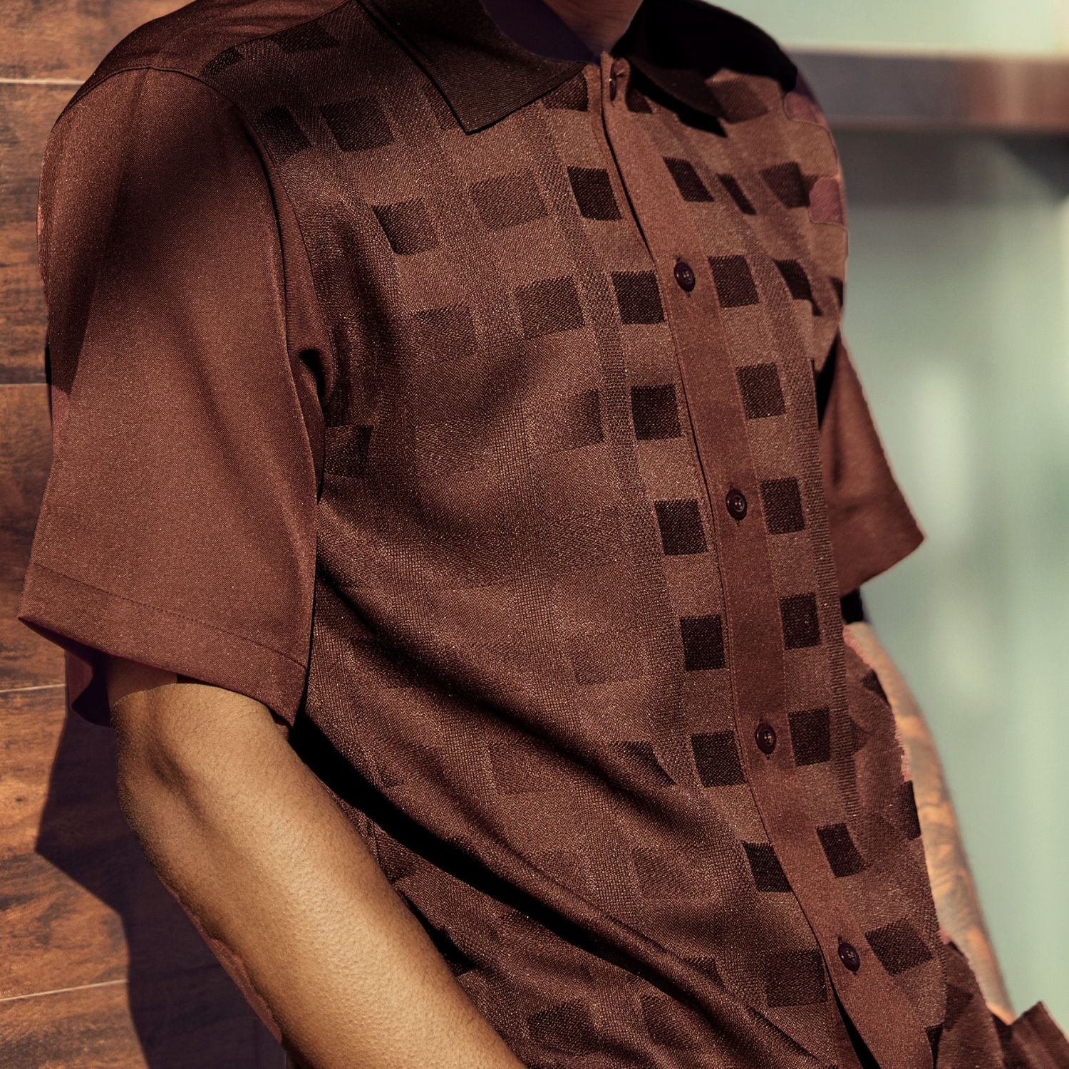 Front view of the brown short sleeve men's walking suit shirt. 