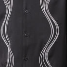 Black polyester men's walking suit short sleeve showing tonal wavy puff panel detail on shirt