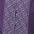 Purple polyester men's walking suit shirt front close-up showing tonal geometric block panel puff detail.