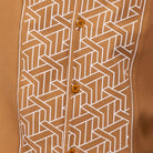 Cappuccino polyester men's walking suit shirt front close-up showing tonal geometric block panel puff detail.
