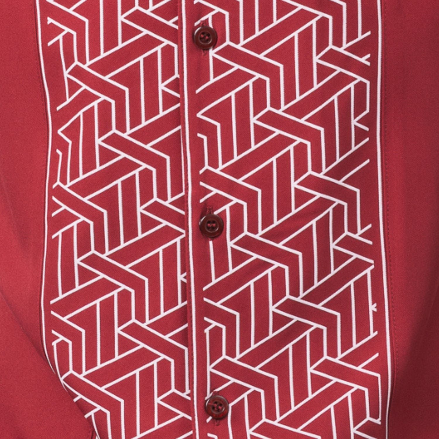 Red polyester men's walking suit shirt front close-up showing tonal geometric block panel puff detail.